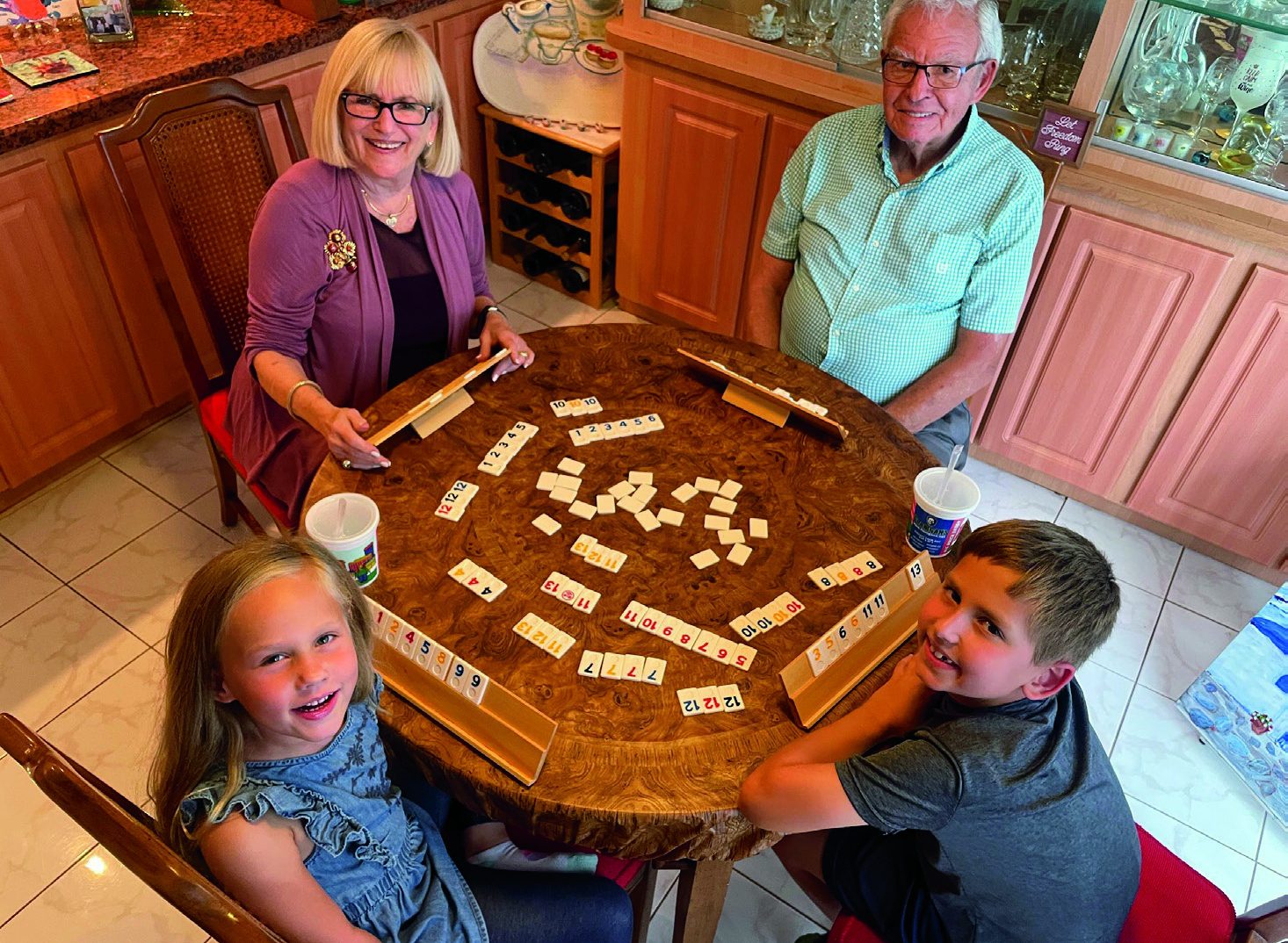 Joanne and I playing Rummikub with Ethan and Sophia