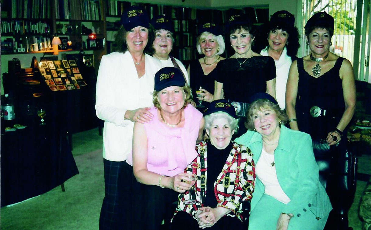 The female cousins are all here enjoying the family get together.
